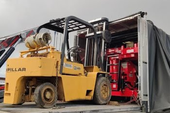 Case Learn about: Delivery a 1999 Caterpillar Forklift on a Conestoga Trailer