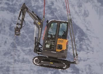 Electrical excavator airlifted to Alpine summit for difficult lodge process
