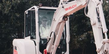 Takeuchi compact excavators take centre level