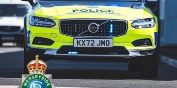 Twelve charged in Liverpool bribery probe