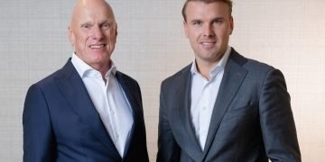 Downing promotes son to joint CEO