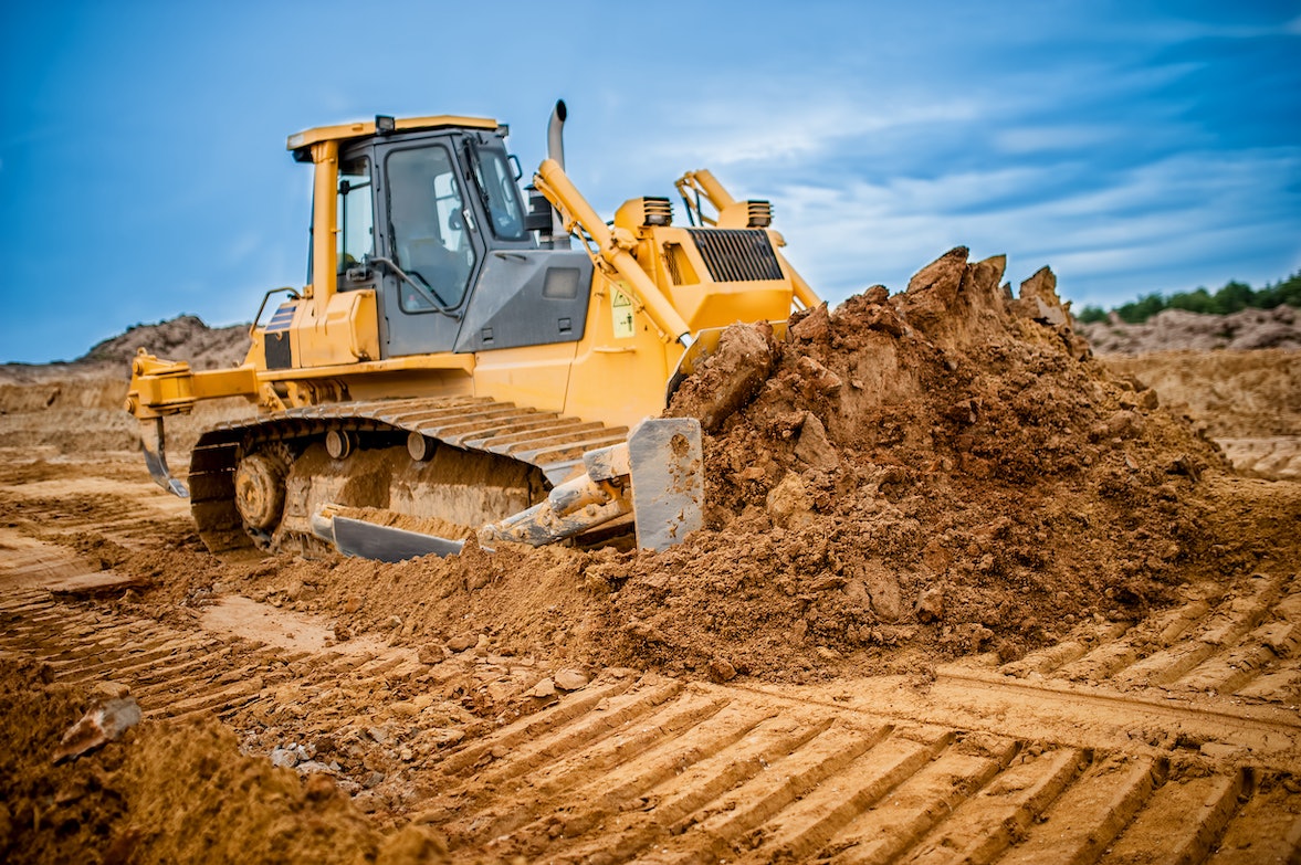Truck Motive force Overwhelmed Between Backing Dozer and Truck in Florida Truck Motive force Overwhelmed Between Backing Dozer and Truck in Florida