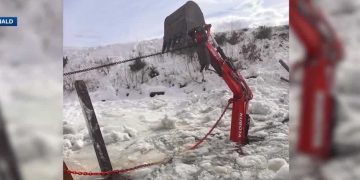 Excavator pulled from Paugus Bay after falling via ice