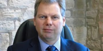 Benefit development for employee-owned Triton
