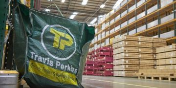 Travis Perkins beneath fireplace for exchange in fee phrases