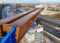 4,600-tonne viaduct slid over are living highway