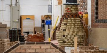 Malvern scholars construct brick snowman