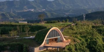 Earth-clad trees arches form scenic new pavilion