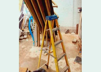 Building corporate fined after step ladder fall