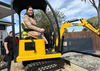 Minister digs in for mini excavator journey