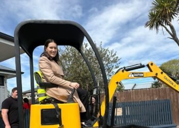 Minister digs in for mini excavator journey
