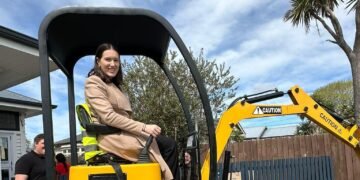 Minister digs in for mini excavator journey